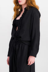 Washed fluid viscose shirt with ruffled colllar and buttonlining